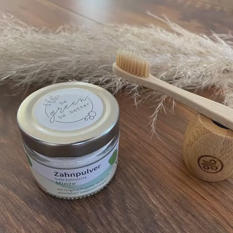 Zahnpulver Minze im Glasbehälter